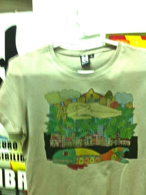 CAMISETA CHICA ARENA T/M METÁFORAS DEL MUNDO.