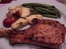 Chuletas en salsa agridulce y medallones de póllo en salsa de champiñones